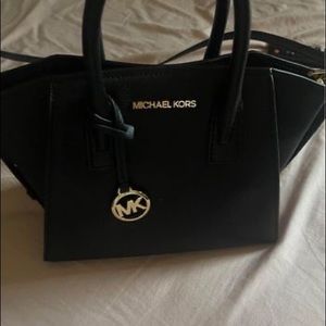 Authentic MK crossbody paid over $260 asking $150 well taken care of no stains